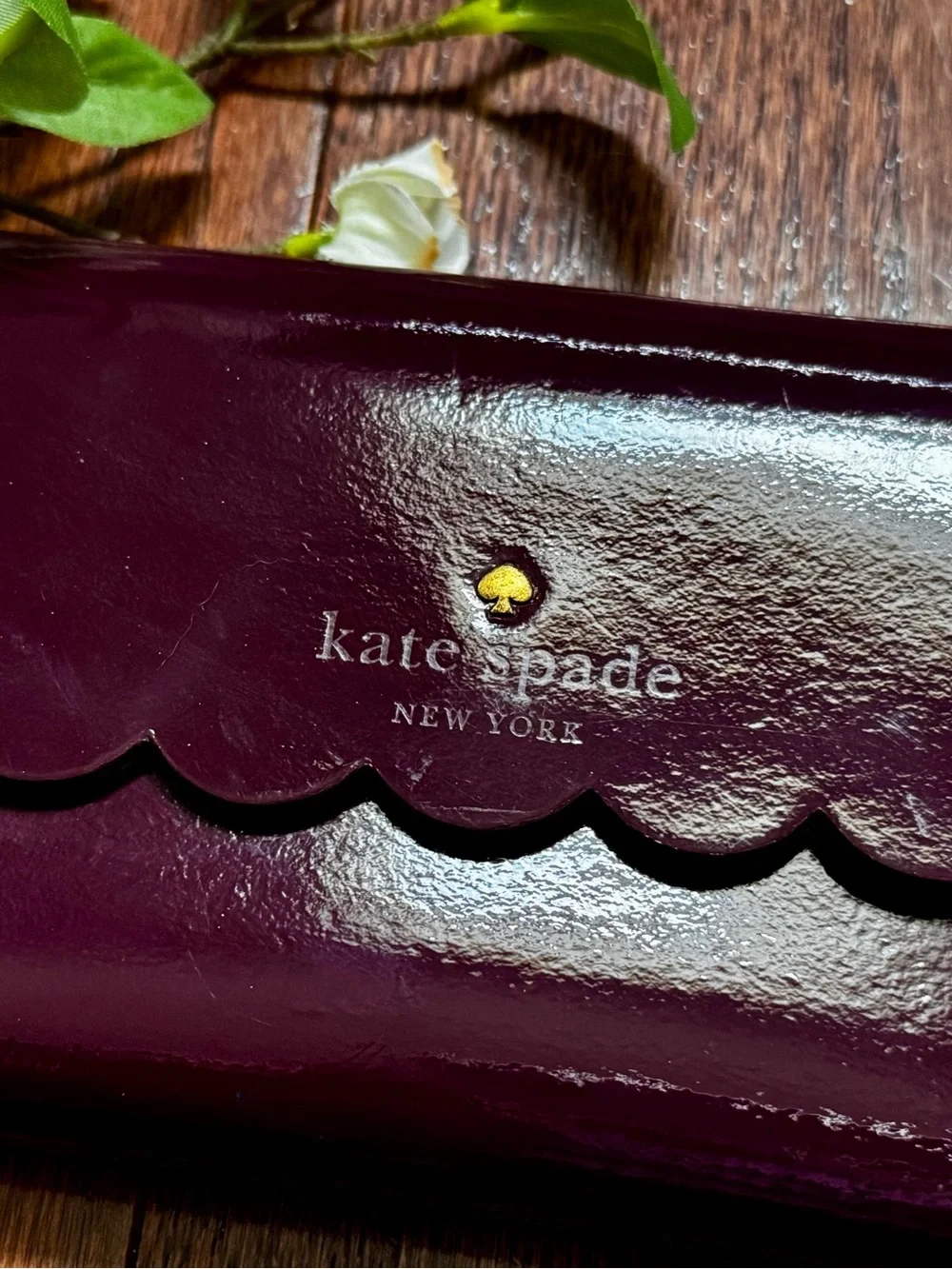 KATE SPADE Mahogany/Radish Lily Avenue Patent Leather Kieran Trifold Wallet